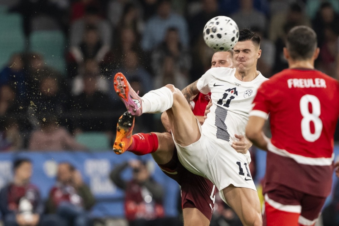 Slovenski nogometaši remizirali s Švico