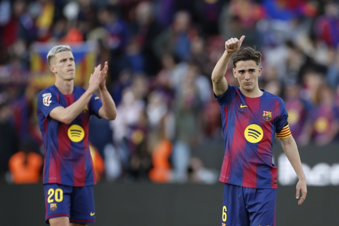Barca po visoki zmagi nad Sevillo spet štiri točke pred Realom